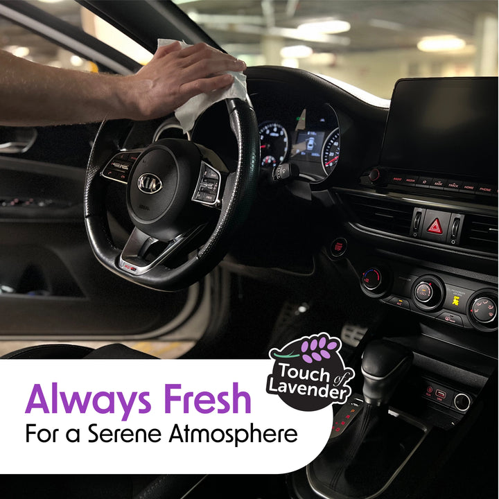 Cleaning a steering wheel with a Wipex® lavender auto interior wipe